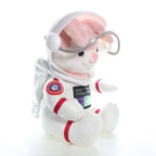 Coelho astronauta de perfil, com o capacete aberto e a mochila espacial